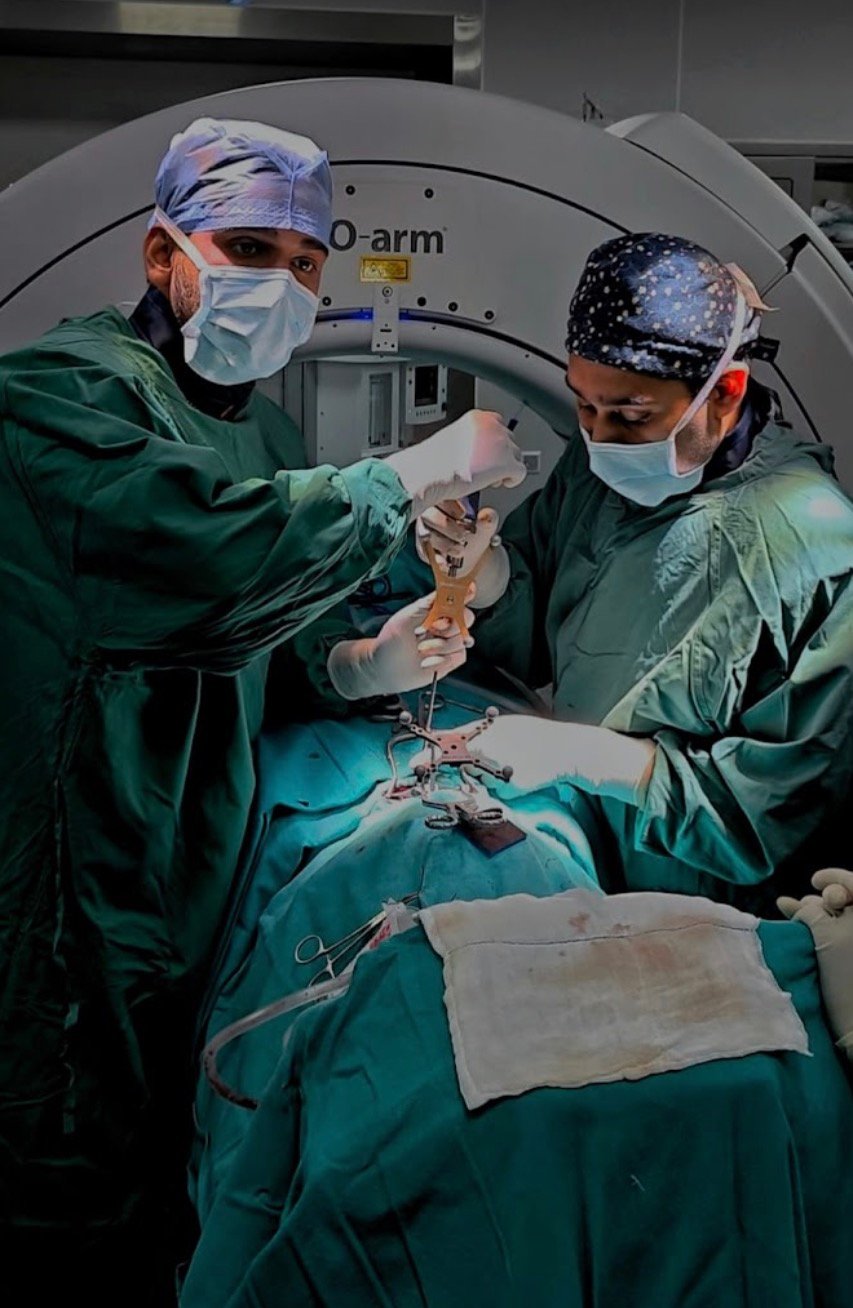 Dr. Tushar Sharma performing neurosurgery